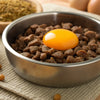Is It OK to Put Raw Egg on Dog Food? Exploring the Risks and Benefits for Your Dog’s Health